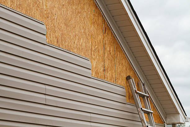 Professional Siding Installation technician working in Clymer, PA
